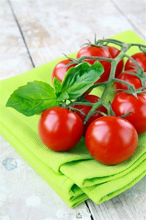 Tomatoes Cherry fresh ripe on the kitchen towel Stock Photo - Budget Royalty-Free & Subscription, Code: 400-04373826