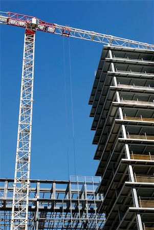 paolikphoto (artist) - Building under construction, taken from street level, in an architectural complex. Stock Photo - Budget Royalty-Free & Subscription, Code: 400-04384495