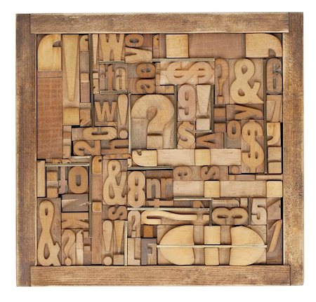 box of vintage wood printing blocks - letters, numbers, symbols, punctuation marks, brass inserts Stock Photo - Budget Royalty-Free & Subscription, Code: 400-04384723