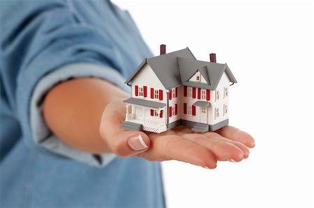 simsearch:400-07952800,k - Model House in Female Hand Isolated on One Side with a White Background. Fotografie stock - Microstock e Abbonamento, Codice: 400-04384909