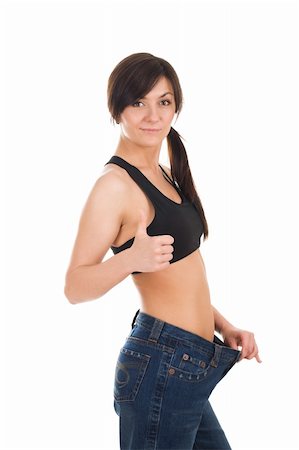 simsearch:400-04150815,k - Young woman in her old jeans after losing weight. Stock Photo - Budget Royalty-Free & Subscription, Code: 400-04385198