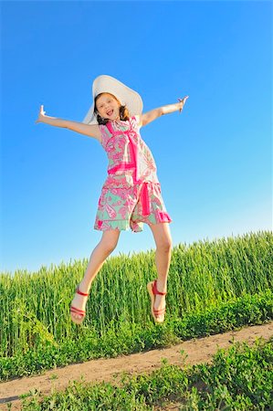 simsearch:400-06570159,k - Jumping girl Photographie de stock - Aubaine LD & Abonnement, Code: 400-04385258