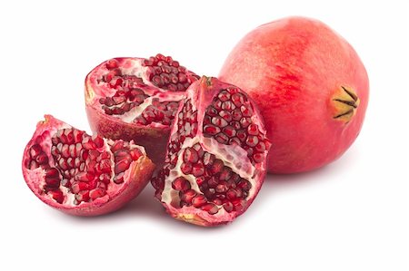 simsearch:400-05196174,k - Full and open pomegranate isolated on white background Photographie de stock - Aubaine LD & Abonnement, Code: 400-04385252