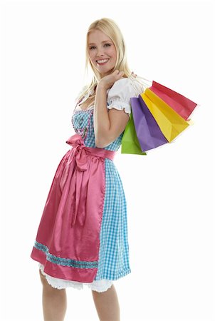 Woman in Dirndl with Shopping Bags Stock Photo - Budget Royalty-Free & Subscription, Code: 400-04385834