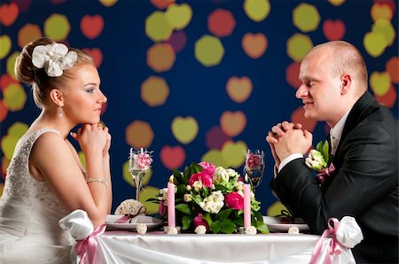 friends table indoor dinner - bride and groom are sitting at cafe Stock Photo - Budget Royalty-Free & Subscription, Code: 400-04386383