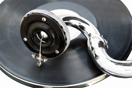 Antique old player (gramophone) isolated on a white background Foto de stock - Super Valor sin royalties y Suscripción, Código: 400-04386401