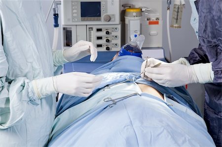 doctor in operation theater - Closeup of a surgery in the operation theatre Stock Photo - Budget Royalty-Free & Subscription, Code: 400-04386465