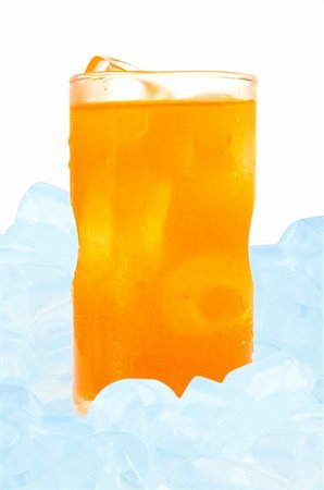 orange juice in glass and ice isolated on white background Stock Photo - Budget Royalty-Free & Subscription, Code: 400-04386760