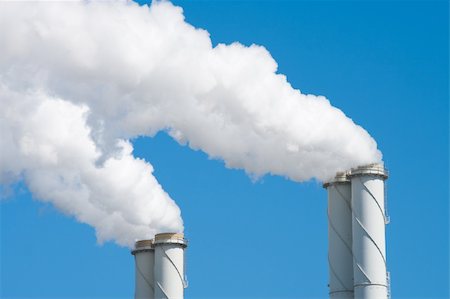 simsearch:400-05178887,k - smoking chimneys from a power plant against a blue sky Fotografie stock - Microstock e Abbonamento, Codice: 400-04386808