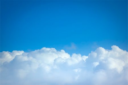 An image of a flight over the clouds Foto de stock - Super Valor sin royalties y Suscripción, Código: 400-04387003