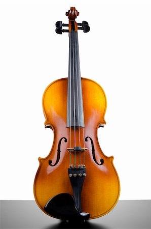 simsearch:400-05292647,k - Violin on top of dark table ppartially isolated on white background. Stock Photo - Budget Royalty-Free & Subscription, Code: 400-04387819