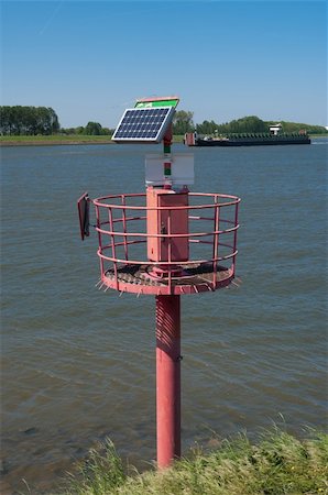 simsearch:400-05381171,k - small solar powered lighthouse in the rotterdam harbor Foto de stock - Super Valor sin royalties y Suscripción, Código: 400-04389139