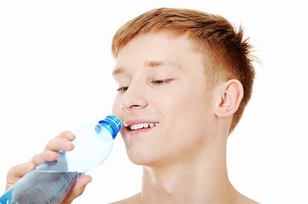 satisfied (thirst) - Young male drinking water , isolated on white background Foto de stock - Super Valor sin royalties y Suscripción, Código: 400-04389888