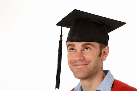 simsearch:400-07478559,k - portrait of a young man looking up to his graduation hat Foto de stock - Super Valor sin royalties y Suscripción, Código: 400-04380032