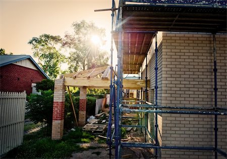 simsearch:400-05344387,k - residential reconstruction home framing against evening sky Stock Photo - Budget Royalty-Free & Subscription, Code: 400-04380864