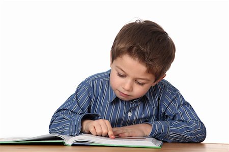 simsearch:400-04622918,k - cute young boy doing homework Stock Photo - Budget Royalty-Free & Subscription, Code: 400-04381426