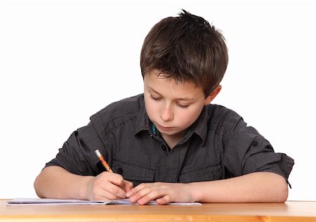 simsearch:400-04123378,k - cute young boy doing homework Photographie de stock - Aubaine LD & Abonnement, Code: 400-04381420