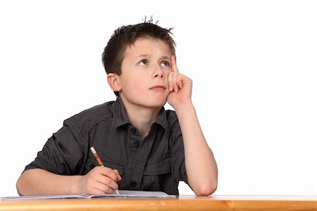 simsearch:400-04622918,k - cute young boy doing homework Stock Photo - Budget Royalty-Free & Subscription, Code: 400-04381421