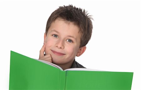 simsearch:400-04622918,k - cute young boy doing homework Stock Photo - Budget Royalty-Free & Subscription, Code: 400-04381423