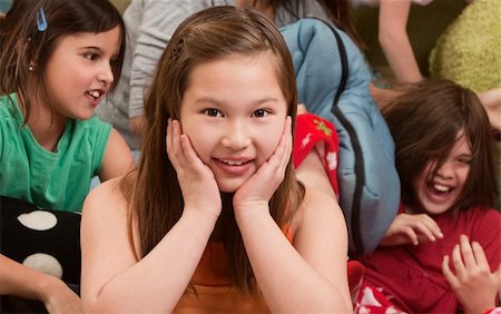 Smiling little girl at a sleepover with her friends Stock Photo - Budget Royalty-Free & Subscription, Code: 400-04382088