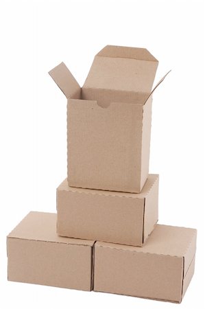 simsearch:400-07832326,k - Brown cardboard boxes arranged in stack on white background Stockbilder - Microstock & Abonnement, Bildnummer: 400-04382119