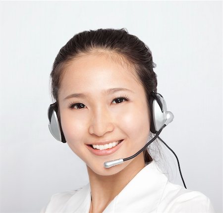 simsearch:400-04632513,k - portrait of beautiful asian Customer Representative with headset Photographie de stock - Aubaine LD & Abonnement, Code: 400-04382578