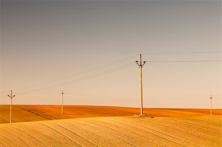 simsearch:400-04782405,k - Power-transmission poles on the empty field in spring Photographie de stock - Aubaine LD & Abonnement, Code: 400-04382685