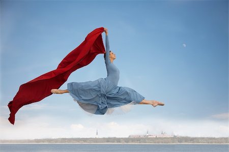 red scarf woman - fluing proffesional ballerina jumping over old Tallinn Stock Photo - Budget Royalty-Free & Subscription, Code: 400-04382742