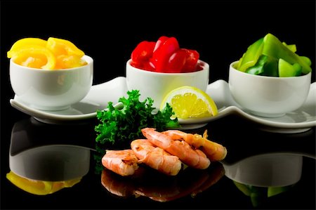 photo of grilled  king prawns on black glass table with reflection Stock Photo - Budget Royalty-Free & Subscription, Code: 400-04383934