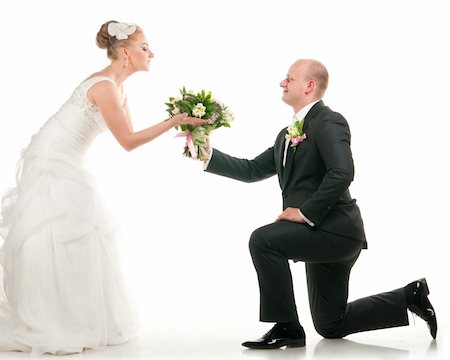 elegant bride hairstyle - groom and bride are holding bridal bouquet, cut out from white Foto de stock - Super Valor sin royalties y Suscripción, Código: 400-04383936