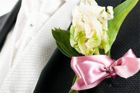simsearch:400-04171391,k - closeup view of flower on groom suit Stock Photo - Budget Royalty-Free & Subscription, Code: 400-04383939