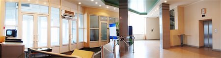 Wide panoramic shot of the security entrance hallway through the tourniquets. Fotografie stock - Microstock e Abbonamento, Codice: 400-04394023