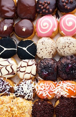 Variety of Baby donuts in box Stock Photo - Budget Royalty-Free & Subscription, Code: 400-04394126