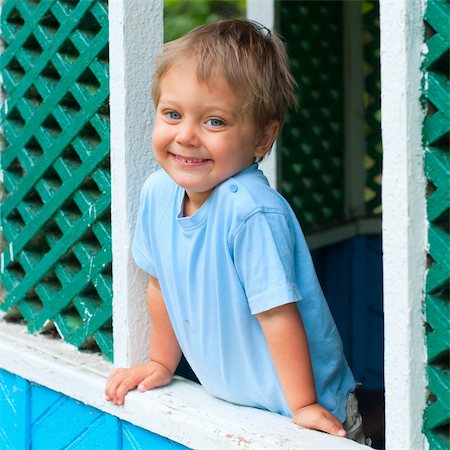 Cute 2 years old boy sitting in the summer house in park Stock Photo - Budget Royalty-Free & Subscription, Code: 400-04394293