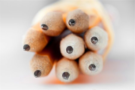 simsearch:400-05294430,k - Several yellow pencils against a white background Fotografie stock - Microstock e Abbonamento, Codice: 400-04394461