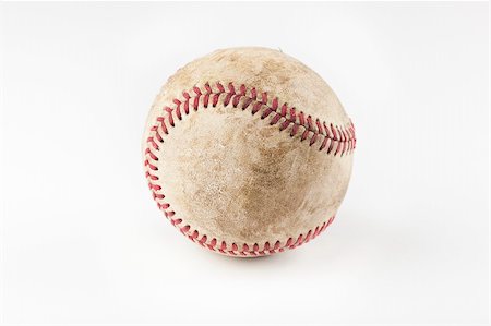 simsearch:400-04673387,k - An old worn baseball against a white background Stock Photo - Budget Royalty-Free & Subscription, Code: 400-04394463