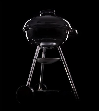 A picture of a new black barbecue over black background Photographie de stock - Aubaine LD & Abonnement, Code: 400-04395526