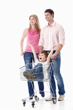 simsearch:400-04323202,k - Young couple in a cart driven by his son on a white background Stock Photo - Budget Royalty-Free & Subscription, Code: 400-04395969