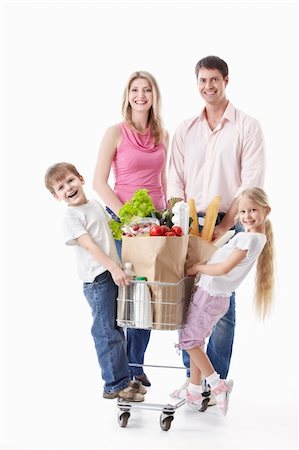 simsearch:400-04323202,k - A happy family with a cart with food on a white background Stock Photo - Budget Royalty-Free & Subscription, Code: 400-04395971
