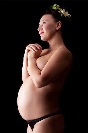 simsearch:400-04396054,k - Beautiful young pregnant woman, isolated on black Photographie de stock - Aubaine LD & Abonnement, Code: 400-04396051