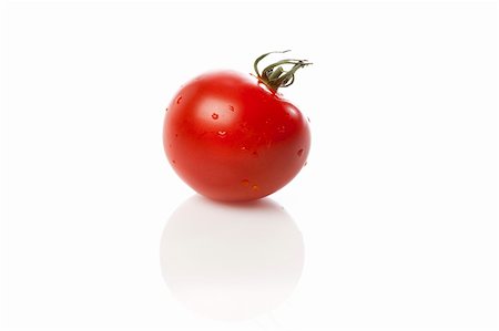 simsearch:400-06101333,k - A red tomato on a white background Stock Photo - Budget Royalty-Free & Subscription, Code: 400-04396237