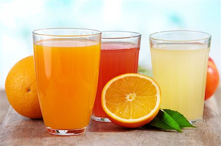 three glasses of fresh juice and oranges Stock Photo - Budget Royalty-Free & Subscription, Code: 400-04397079