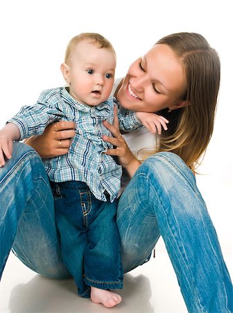 simsearch:400-06172843,k - happy mother with a baby on a white background Stock Photo - Budget Royalty-Free & Subscription, Code: 400-04397365