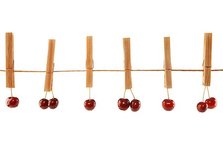 simsearch:400-06921455,k - Sweet red cherries and clothes line isolated on a white background Foto de stock - Super Valor sin royalties y Suscripción, Código: 400-04397476