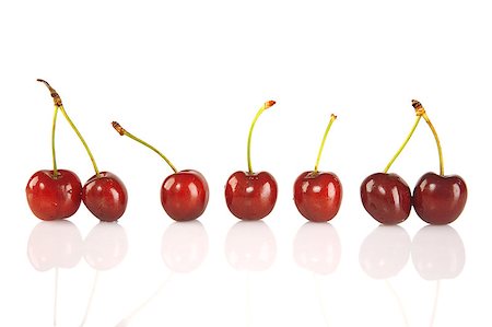 simsearch:400-08341539,k - Sweet red cherries isolated on a white background Stockbilder - Microstock & Abonnement, Bildnummer: 400-04397478