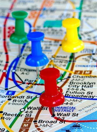 The red pin nailed on the Wall Street stop. Other color pins nailed on different places. Stock Photo - Budget Royalty-Free & Subscription, Code: 400-04397687