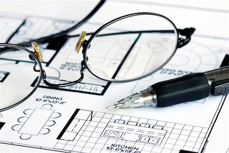 reconstruyendo - An architect prepares the floorplan for a residence Photographie de stock - Aubaine LD & Abonnement, Code: 400-04398007