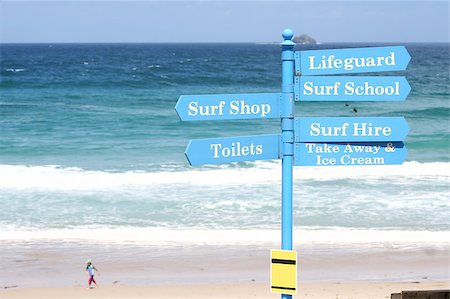 Surf school sign post in Cornwall Stockbilder - Microstock & Abonnement, Bildnummer: 400-04398187