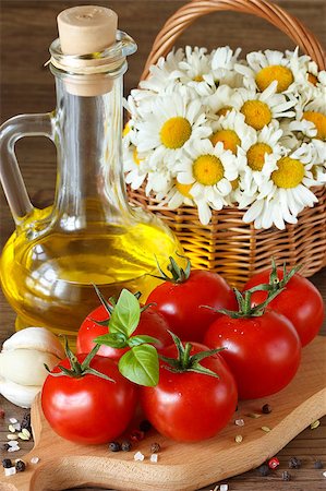 Fresh summer tomatoes with basil, spices and olive oil. Stock Photo - Budget Royalty-Free & Subscription, Code: 400-04398377