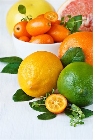 simsearch:825-05986695,k - Assortment fresh citrus fruit on a white wooden board. Stock Photo - Budget Royalty-Free & Subscription, Code: 400-04398372